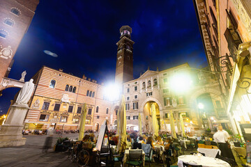 Busy tourist area of Verona at night