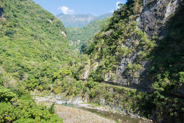Fototapeta na wymiar Shakadang Trail (Mysterious Valley Trail) view from Shakadang Bridge at Taroko National Park. a famous tourist spot in Xiulin, Hualien, Taiwan.