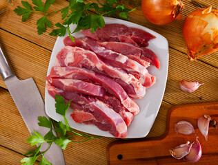 Pieces of raw turkey thigh