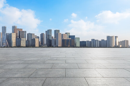 Empty square floor and modern city scenery in Hangzhou,China. © ABCDstock