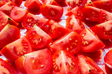 Slices of Italian red tomatoes close-up.