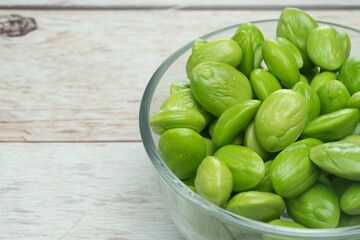 Bettter beans in glass bowl on wood table