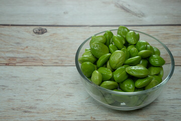 Bettter beans in glass bowl on wood table