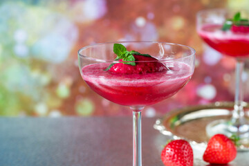 Festive vodka and prosecco cocktail with strawberry sorbet