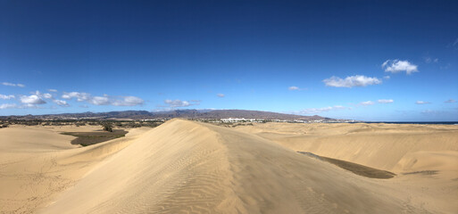 Fototapeta na wymiar Panorama from the sand dunes of Maspalomas