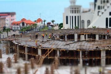 The workers are working at the construction site