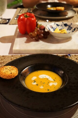 Close up bowl of pumpkin soup
