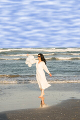 Beauy woman in white at sea