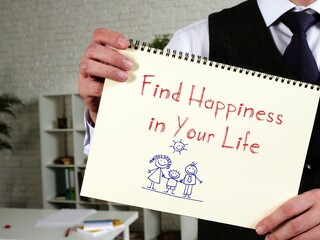 Find Happiness in Your Life inscription on the sheet.