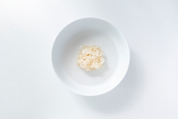 Close up of snow fungus soaking in a bowl