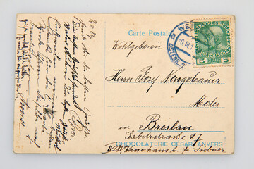 Fototapeta na wymiar used old 100 years postcard backside