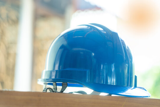 Blue hard safety helmet hat for safety workman as engineer or worker.