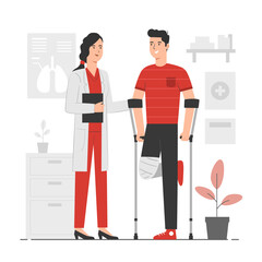 Man with leg injury talking with a female doctor