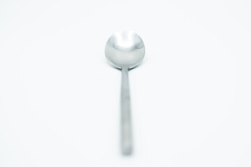 isolated stainless spoon in a white background