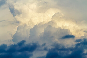 Fluffy white clouds flying on blue sky background