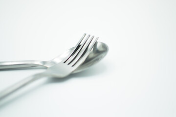 isolated stainless fork and spoon