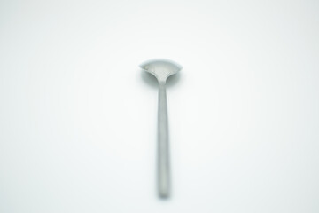 isolated stainless spoon in a white background