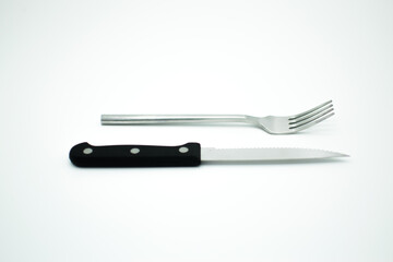 stainless fork and knife on white background