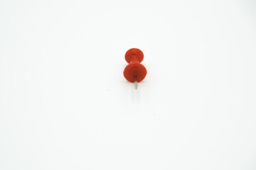 isolated red pushpin in a white background