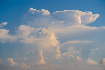 White clouds and blue sky, a view from airplane window