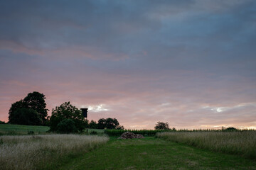 High seat with field and dawn clouds