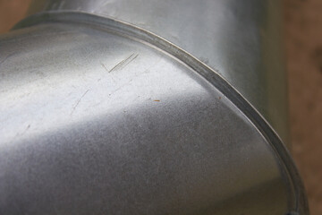 galvanized pipe riveted,close up of a galvanized sheet connection in a drainage pipe