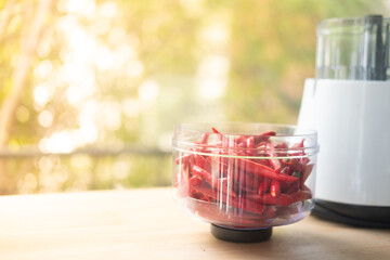 Red chilli in bowl blend ready for blend in blender containe