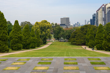 View of the Shrine of Remembrance with people and tourists in Melbourne Victoria Australia. It was built to honour the men and women of Victoria who served in World War I