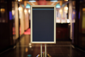  Black board for inscription before restaurant  with words  dear guests.