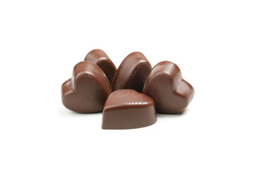Tasty chocolate candies in the heart form isolated on white background