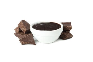 Melted chocolate and chocolate pieces isolated on white background