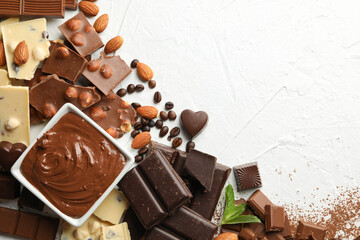 Chocolate, melted chocolate, coffee and almond on white background