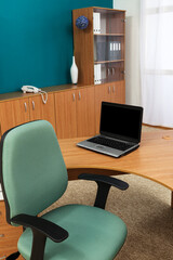 Fototapeta premium workplace with laptop in modern office