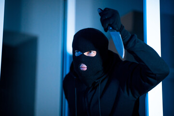 Criminal breaking in an apartment or office with a knife