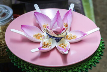 Fototapeta na wymiar Miang Kham Bua Luang Thai traditional appetizer food, eat with pink lotus petal