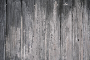 Naklejka premium Background old grey dark wooden wall made of planks