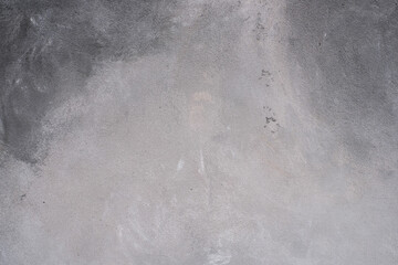 Grey background plaster wall background pattern with high resolution. The view from the top. A copy of the space.
