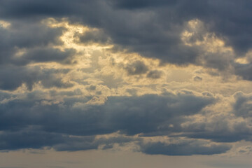 Fototapeta na wymiar Cloudy clouds covered the evening sun. Sky before the rain
