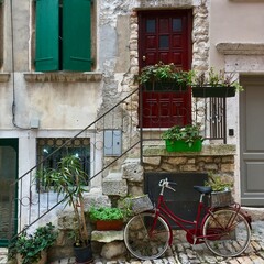 Fototapeta na wymiar bicycle in front of a house in rovinj croatia