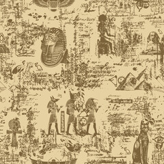 Fototapeta na wymiar Ancient Egypt seamless pattern with sketches of Egyptian gods and illegible scribbles in retro style. Vector abstract background in beige tones. Suitable for Wallpaper, wrapping paper, fabric