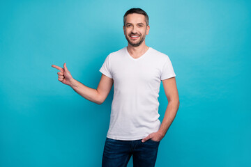 Fototapeta premium Portrait of his he nice attractive content cheerful cheery bearded guy showing copy empty blank space isolated over bright vivid shine vibrant blue color background
