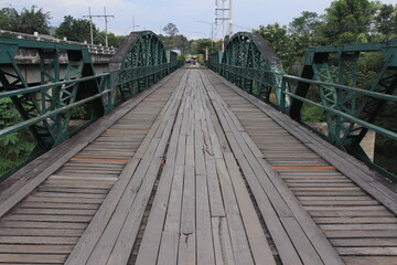 Fototapeta premium wooden bridge over the river