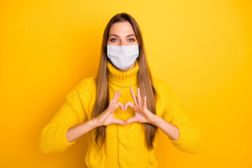 Portrait of her she nice attractive healthy girl wearing safety mask showing heart sign stop...