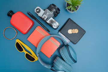 Travelling essentials with analogue camera.