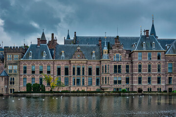 Fototapeta na wymiar View of the Binnenhof House of Parliament and the Hofvijver lake. The Hague, Netherlands