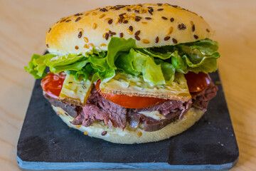 beef burger, cheese, tomatoes, salad