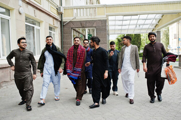 Group of pakistani man wearing traditional clothes salwar kameez or kurta.