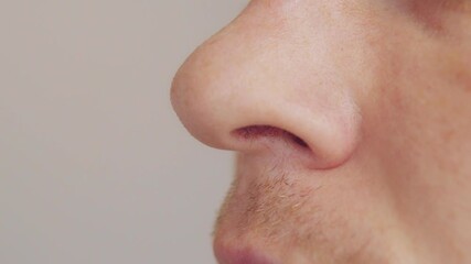Man's nose close-up. Sense of smell