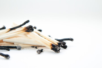 Burned sticks on a white background