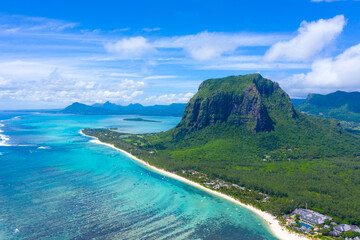 Aerial view of Le Morne Brabant, a UNESCO world heritage site.Coral reef of the island of Mauritius. panorama underwater waterfall